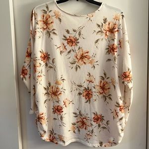 Adorable cream top with crisscross back